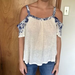 Eyeshadow by buckle cream off the shoulder top